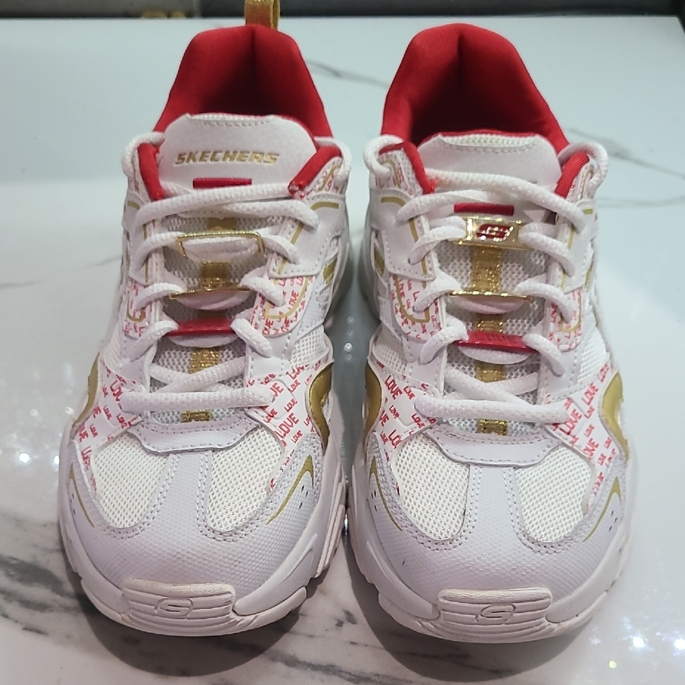 Skechers White Sneakers with Red Lining and Gold Accents